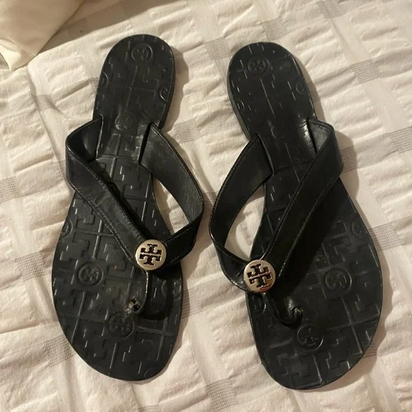 Tory Burch Black Flip Flops with Gold Medallion - Picture 3 of 3